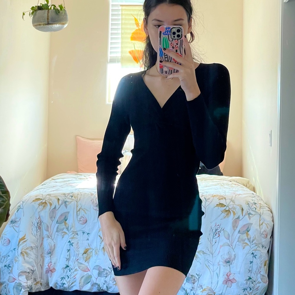 Black cable knit sweater dress with knot at bust